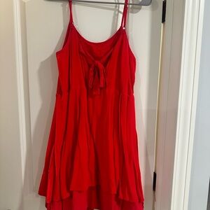 Short red summer dress with bow detail in back